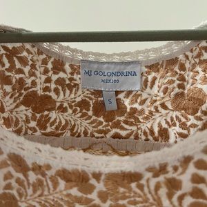 White and gold embroidered Flores top. Recently dry cleaned.